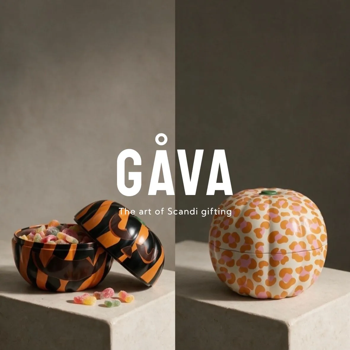 Painted ceramic baubles and a patterned pumpkin on a stone plinth, with the Gåva wordmark